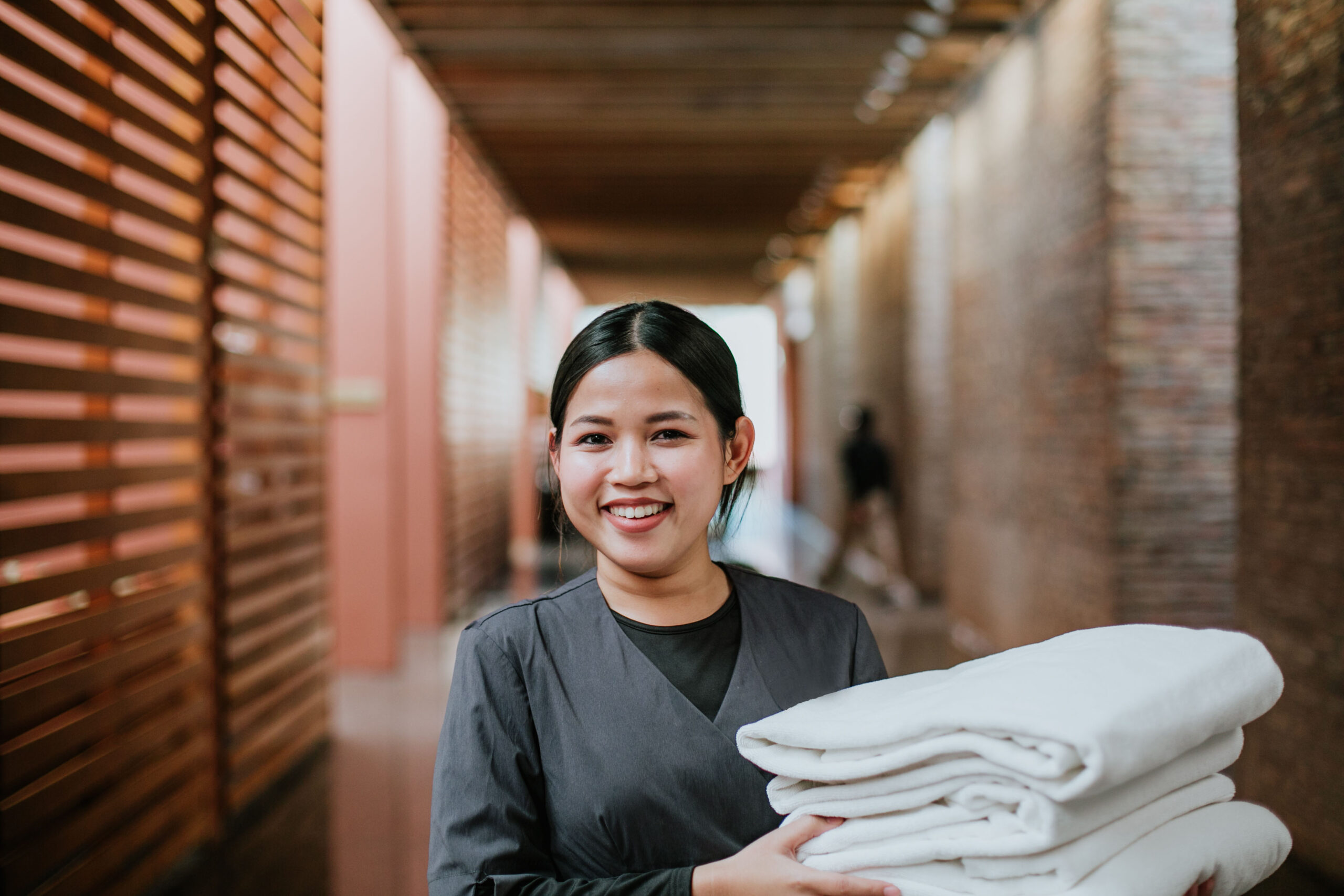 person holding towels